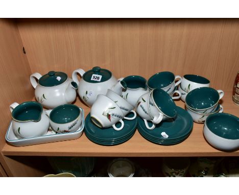 A DENBY GREEN WHEAT PATTERN TEA SET, comprising two tea pots, two milk jugs, four sugar bowls, eight cups and saucers and a r
