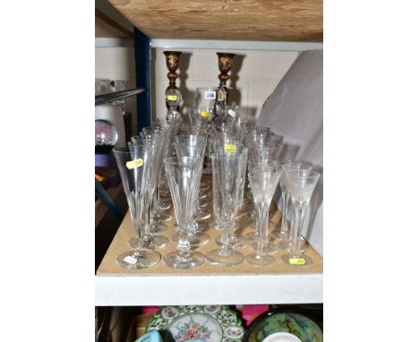 A QUANTITY OF 19TH AND 20TH CENTURY CHAMPAGNE FLUTES AND OTHER DRINKING GLASSES, together with an onion shaped decanter with 