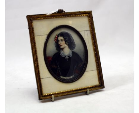 Miniature portrait oval painting of a lady in black dress signed M.Stielen in brass frame with ivory borders, 13 x 11cm