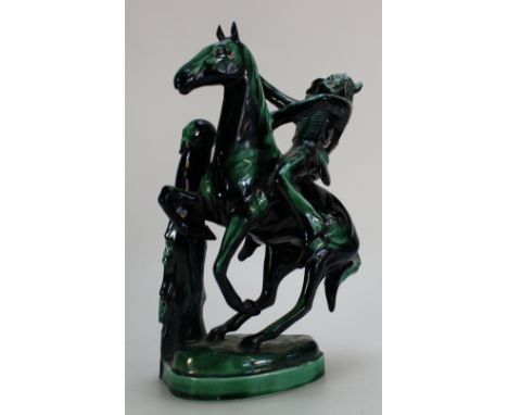 Beswick prototype model of Indian chief on horse in green & black glaze, height 26cm  (horn on headdress re-stuck and the oth