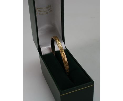9ct Gold ornate bangle (5.8 grams)