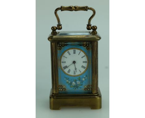 Cased Carriage clock with blue enameled panels to all sides 