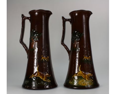 Royal Doulton pair Kingsware jugs decorated all around with hunting scenes, height 27cm  (2)