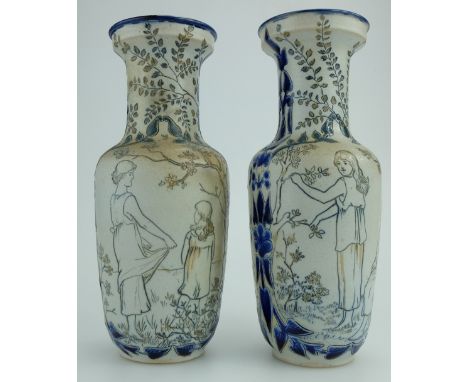 A pair of Doulton Lambeth baluster vases, designed by Mary Mitchell, incised with women and children playing in a stylized la