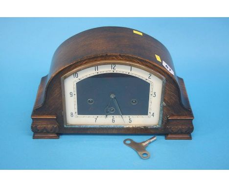 An oak Art Deco style mantle clock