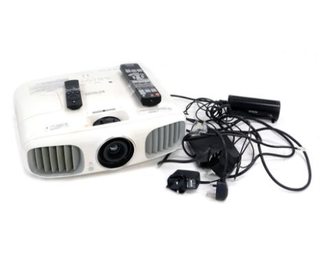 An Epsom EH-TW6000W HD ready projector, with Amazon box, etc. 