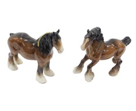 Two Beswick ceramic brown glazed shire horses, 26cm long.