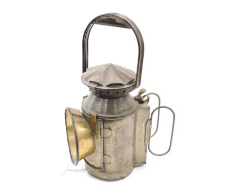 A railway related lamp, bearing stamp SER, in tin with brass fittings.