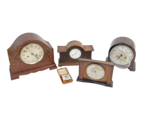An early 20thC inlaid mahogany mantel clock, a Bakelite mantel clock stamped Smiths, etc. (5)