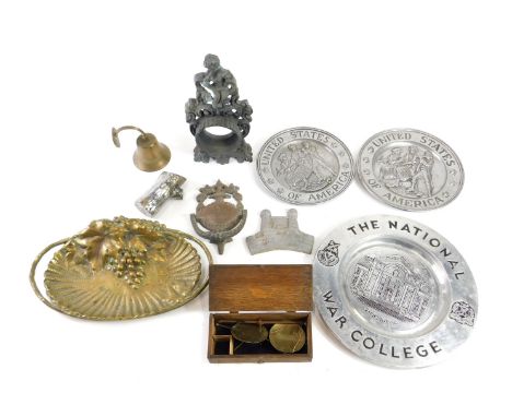 Miscellaneous metalware, to include a cast iron clock case, three United States of America cast aluminium plaques, a heavy br