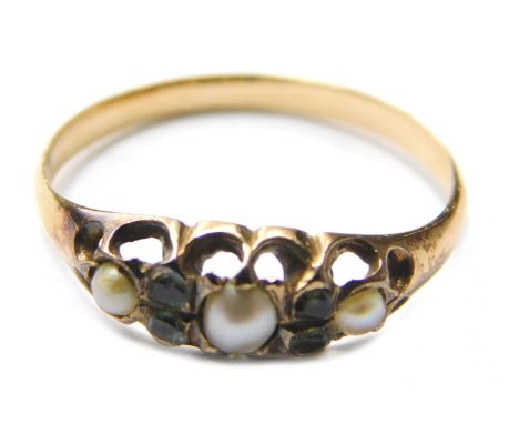 A seed pearl and peridot gypsy ring, set with three pearls and two peridot each claw set, unmarked possibly 18ct, 1.5g all in