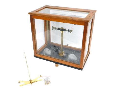 A set of laboratory or chemist scales, with part chrome plated fittings, in teak case, 43cm high, 43cm wide. 