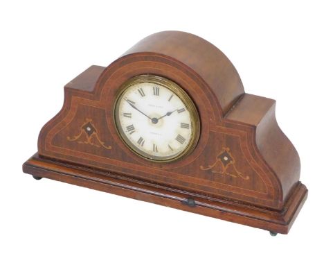 An Edwardian mahogany and marquetry mantel clock, the dial stamped Kendal &amp; Dent London, Swiss made, 30cm wide.
