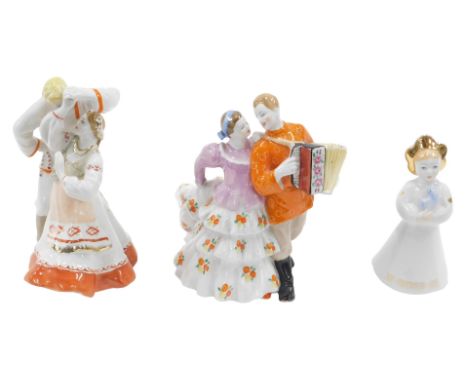 An Avaebo Russian figure group of dancers, 17cm high, another Avaebo figure of gentleman with accordion and a lady, 16cm high