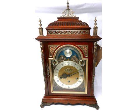 A large walnut and gilt brass mounted eight day musical bracket clock, three train movement, the brass dial with silvered cha