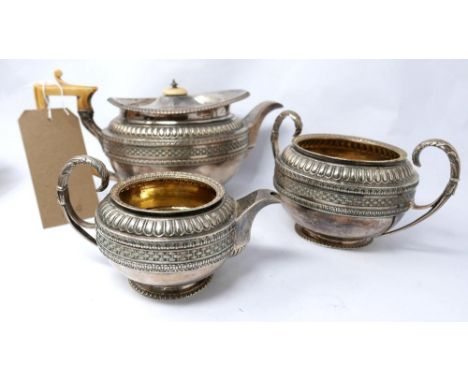 A Georgian silver three piece tea set, Rebecca Emes &amp; Edward Barnard I, London 1809-10, comprising a teapot of large prop