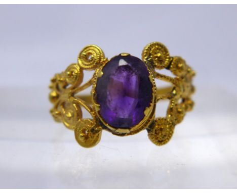 An antique yellow gold, filigree and natural amethyst ring, 2.2g, Ring size: L 