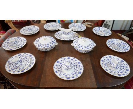 A Spode dinner service in 'Blue Colonel' pattern, consisting of nine dinner plates, nine side plates, larger platter, two lid