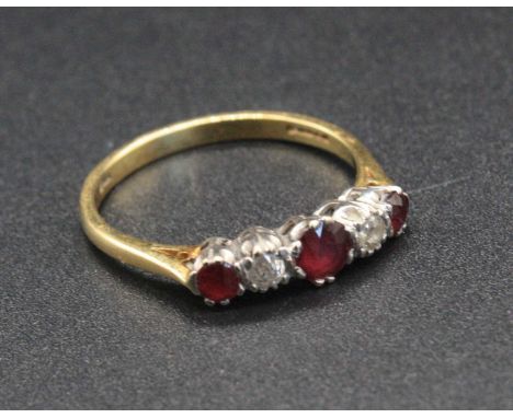 An 18ct gold ruby and diamond five stone ring, 3.2g, size P, sponsor EWA
