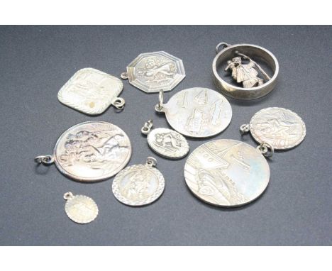 Ten various silver St Christopher pendants, gross weight 53g
