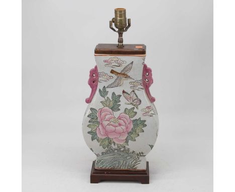 A reproduction Chinese table lamp, of Hu shape, enamel decorated with birds amidst flowers, on a wooden base, h.51cm (includi