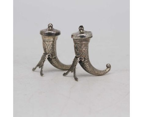 A Norwegian silver salt and pepper cruet, each in the form of a horn, with Nordic style decoration, 1.1ozt