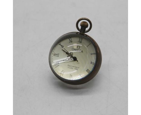 A reproduction ball clock, having manual wind movement, h.7cm