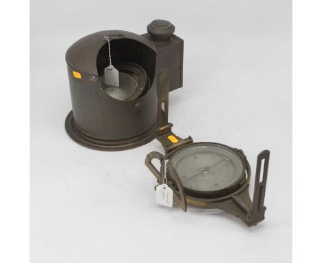 A late 19th/early 20th century lacquered brass mining dial having folding arms with various spirit levels, the silvered dial 