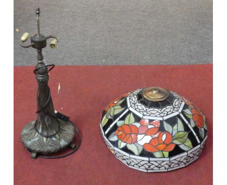 An Art Nouveau style alloy table lamp with Tiffany style leaded glazed shade, height 64cm