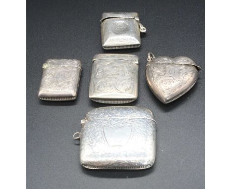 Five various silver vesta cases to include heart-shaped example, all with bright cut engraved decoration, gross weight 3.5oz