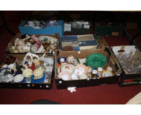 Four boxes of glassware and ceramics to include Poole Pottery and a Royal Doulton figure 'Autumn Breeze'