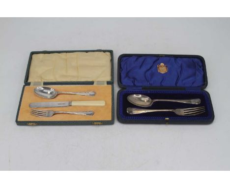 A George VI child's silver cutlery set, comprising fork, spoon and knife, cased, Sheffield 1945; together with a cased silver