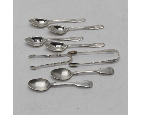 A set of four George V silver grapefruit spoons, Sheffield 1935; together with two silver teaspoons; and two pairs of silver 