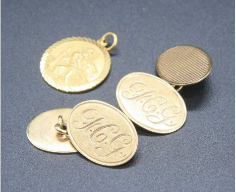 A pair of 9ct gold engine turned and monogrammed gents cufflinks together with a 9ct gold St Christopher pendant, gross weigh
