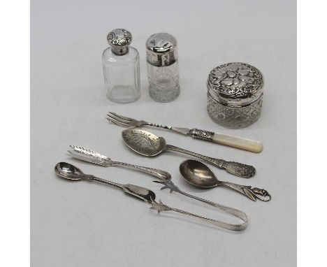 A Danish silver caddy spoon, having stylised handle in the form of a tulip; together with two silver topped dressing jars; a 