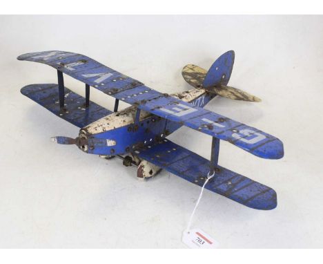 A vintage tinplate model bi-plane, w.46cm 