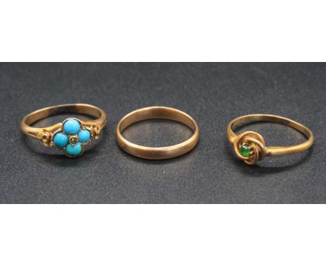 An early 20th century yellow metal and turquoise set dress ring, together with a yellow metal and small emerald set single st