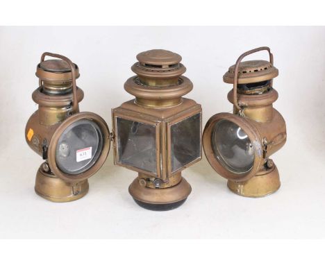 A pair of vintage Powell &amp; Hammer brass carriage lamps, h.26cm; together with a further vintage brass carriage lamp 