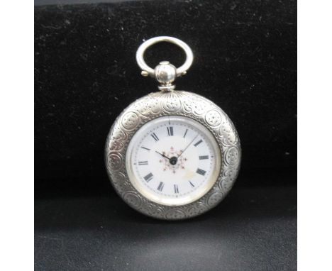 An American fine silver case ladies open face pocket watch having engraved case and key wind movement, dia. 37mm