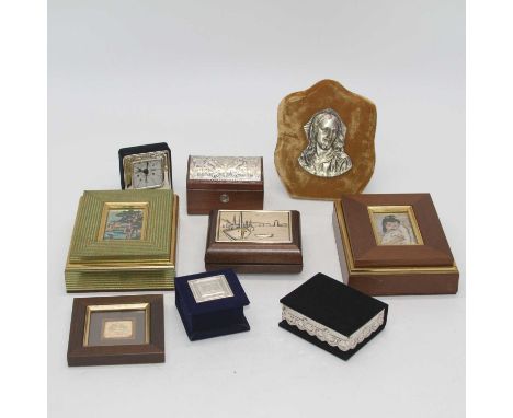 An Italian wooden box with silver plaque inset to the lid depicting a harbour scene; together with two boxes with inset silve