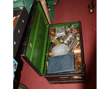 A vintage tin trunk, containing a collection of metalware to include oil lamp 