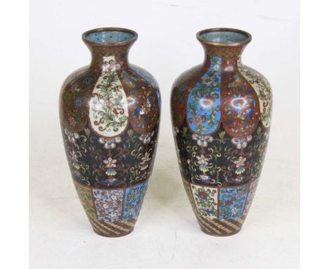 A pair of Chinese cloisonne enamel decorated vases, h.21cm (a/f)