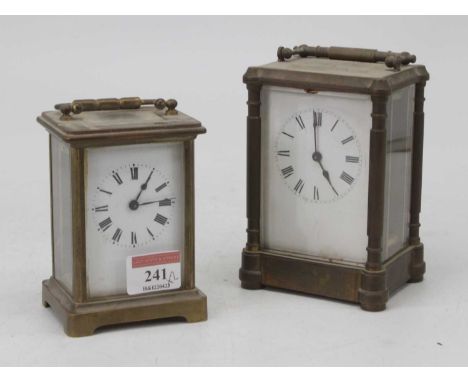 An early 20th century lacquered brass carriage clock, the enamelled dial showing Roman numerals, having visible platform esca