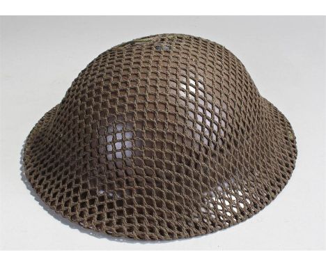 World War II home guard helmet, netted top