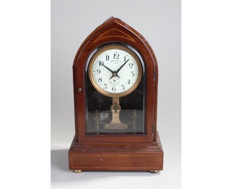 Eureka mantel clock, the mahogany lancet case with white enamel dial, Roman hours, later battery movement, 39cm high