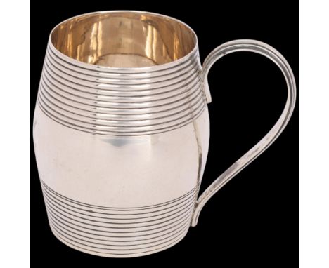 A George III silver 'Barrel' christening mug, possibly by Naphthali Hart, London 1806, bulbous form, with 2 reed bands and re