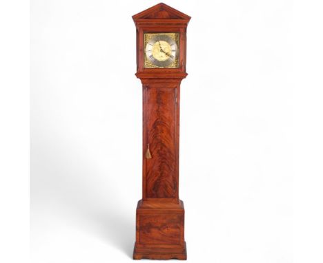 An 18th century mahogany 8-day longcase clock, by Benjamin Reeves of Lamberhurst, the 11" square engraved brass dial having s