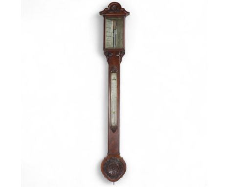 A 19th century carved walnut-cased stick barometer and thermometer, by J Hicks of Hatton Garden London, engraved ivory dials 