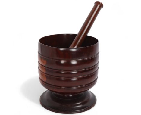 A large turned lignum vitae pestle and mortar, by F J Howe (The Jolly Fisherman), height 20cm, diameter 19cmAll in good condi