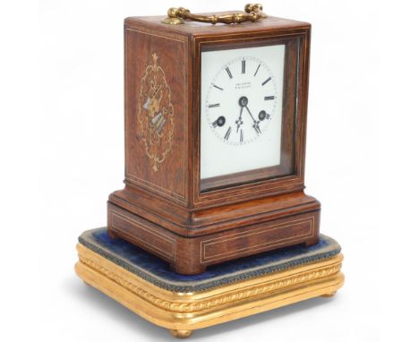 An early 19th century French brass and mother-of-pearl inlaid rosewood library mantel clock, by Paul Garnier of Paris, white 